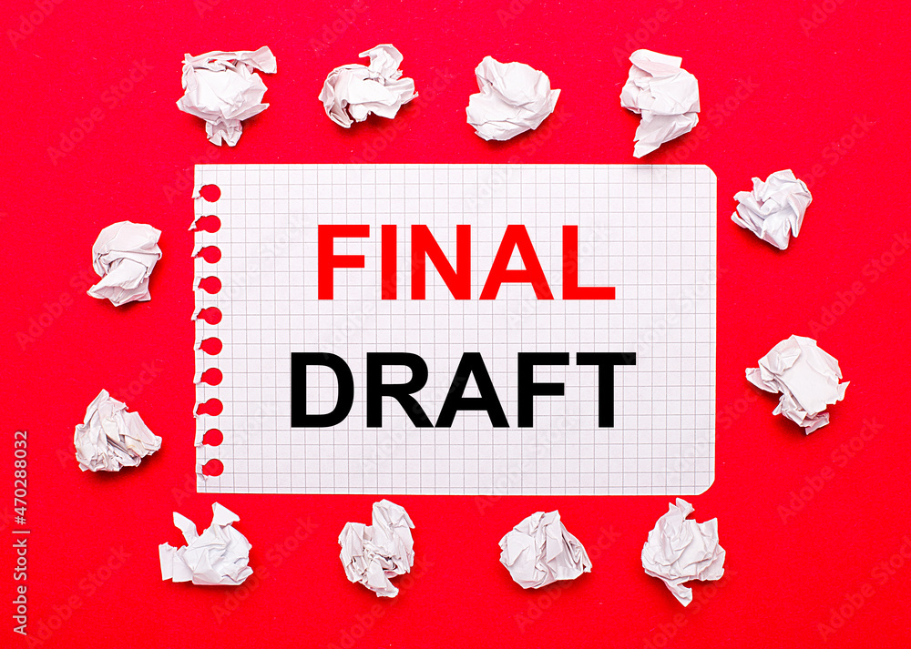 Poster on a bright red background, white crumpled sheets of paper and a sheet of paper with the text final 