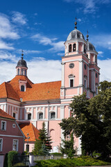 Bell towers of a baroque Catholic church in the city of Sierakow