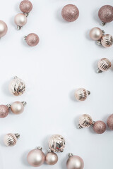 Christmas decorative balls on a white background. Top view, flat lay.