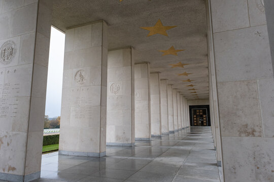 Plombieres, Belgium - November 1, 2021: Henri-Chapelle American Cemetery and Memorial. Many of the burial are from  Ardennes winter offensive (Battle of the Bulge). Autumn rainy day. Selective focus.