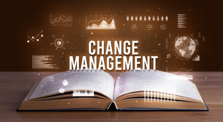 Business inscription coming out from an open book