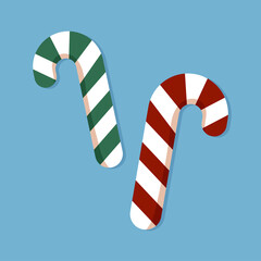 Two christmas striped candy canes. Vector illustration isolated on blue background.