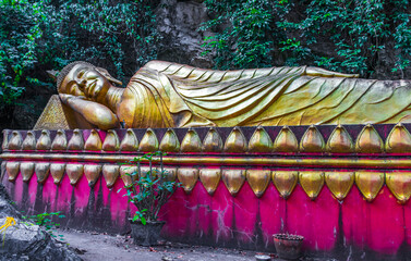Sleeping buddha statue Phousi Hill Wat Chom Si Luang Prabang.
