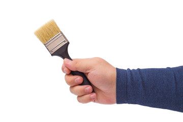 A man's hand holds a paint brush isolated on a white background.