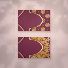 Burgundy business card template with mandala gold pattern for your business.