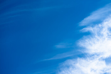 Fototapeta na wymiar Blue sky with white clouds. Heavenly landscape background.