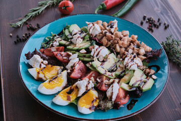 Vegetable salad with eggs and walnuts
