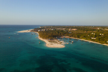 Tropical island of Zanzibar, Tanzania. Coastline, ocean and boats. Amazing nature and beautiful views