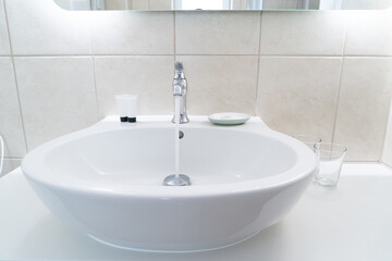 Iron tap with running water