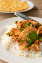 Stir fried pork with yard long bean in red curry paste