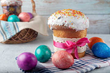 Freshly baked fragrant homemade Easter cake with eggs and the first spring flowers