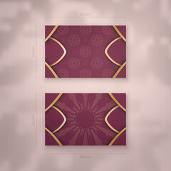 Burgundy business card with mandala gold pattern for your personality.