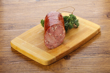 Pork ham sausage over board