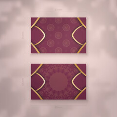 Burgundy business card with vintage gold pattern for your personality.