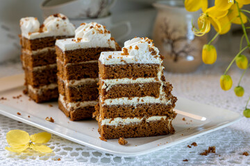 Honey cake. Layered honey cake decorated with cream.