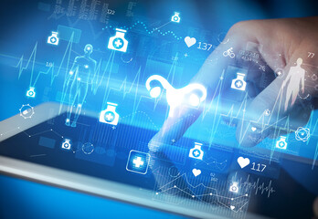 Close-up of a touchscreen with healthcare icons