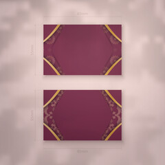 Business card in burgundy color with vintage gold ornament for your contacts.