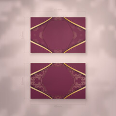 Business card template burgundy with a mandala gold pattern for your contacts.