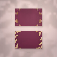 Business card template burgundy with abstract gold pattern for your brand.