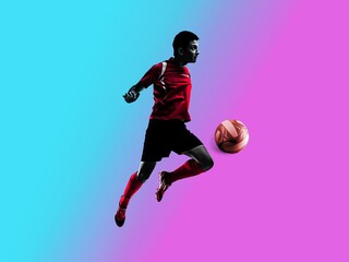 Fototapeta na wymiar Jumping, flying. One young man, professional soccer football player training