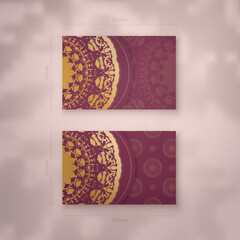 Business card template burgundy with vintage gold ornaments for your brand.