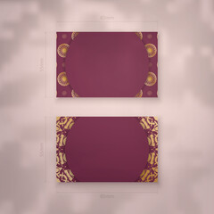 Business card template burgundy with vintage gold pattern for your brand.