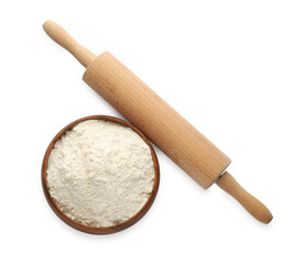 Wooden rolling pin and bowl with flour on white background, top view