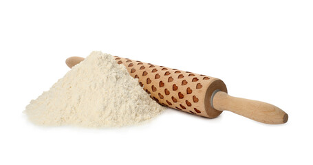 Wooden rolling pin and flour on white background