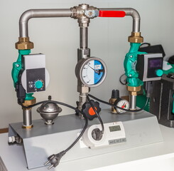 Samples of plumbing equipment in close-up in a metal box in the room