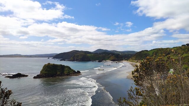 Pacific coast view of Punihuil beach on Chiloe Island, Chile.