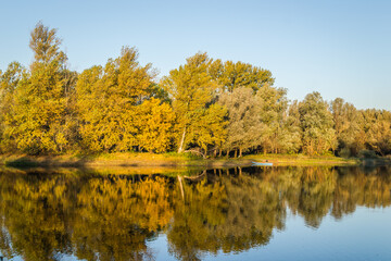 Begec, Serbia - October 30. 2021: Autumn panorama on the artificial lake Begecka jama, near the city of Novi Sad. 