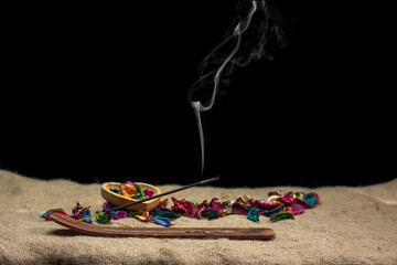 incense on burlap texture, rose petals romantic ambiance
