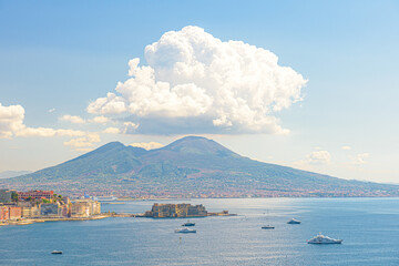 Naples, Italy. August 31, 2021. View of the Gulf of Naples from the Posillipo hill with Mount Vesuvius far in the background and some boats near Castel dell'Ovo.