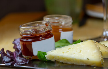 Variety of cheese cut into slices
