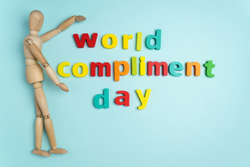 World compliment day, national compliment day 1 march. Blue background. Top view - obrazy, fototapety, plakaty