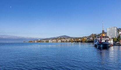 MONTREUX, SWITZERLAND - October 24, 2021: The elegant paddle wheel fleet on the lake. Pleasure boat on Lake Geneva, Switzerland.