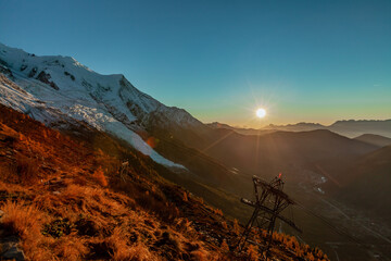 Obraz premium Sunset light on the glacier of a mountain in the Mont Blanc massif in the Alps, France, 2021.