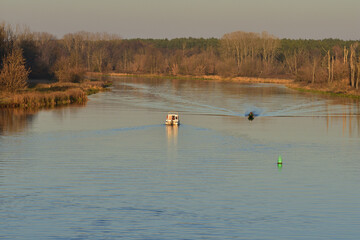 Speedboat on the river on a sunny autumn day. Summer.