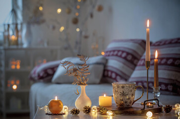 christmas home decorations with candles in white interior
