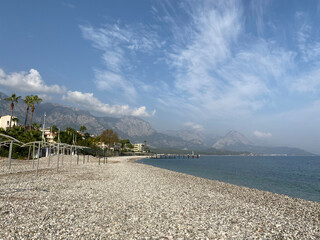 mountain view on the shore of a pebble Turkish beach