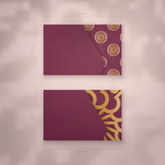 Template Business business card burgundy with mandala gold pattern for your brand.