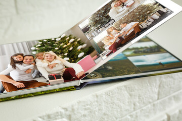 Naklejka na ściany i meble photo book with christmas photos