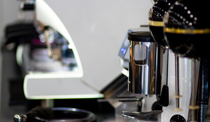 Espresso coffee beans and coffee grinder in a small coffee shop