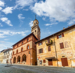 Saluzzo, Cuneo, Italy,  the ancient town hall (15th century) in Salita al Castello with the civic tower and ancient buildings in the old town of Saluzzo