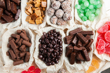 Assortment of delicious chocolate candies background. Chocolate candy isolated 