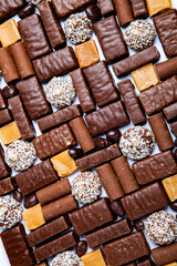 Assortment of delicious chocolate candies background. Chocolate candy isolated 