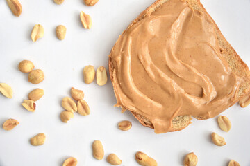 Peanut butter on a slice of bread