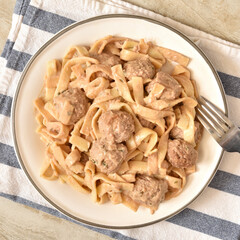 Swedish meatballs with pasta on a plate