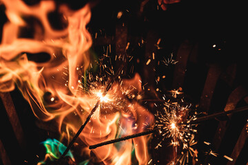 Sparkler and fire colored with magic powder