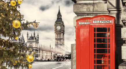 Fototapeta na wymiar London symbols, BIG BEN with Christmas tree and red Phone Booths in England, UK